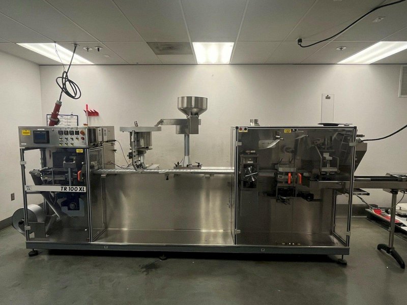 2004 PRECISION GEARS TR-100XL ROTARY BLISTER PACK MACHINE