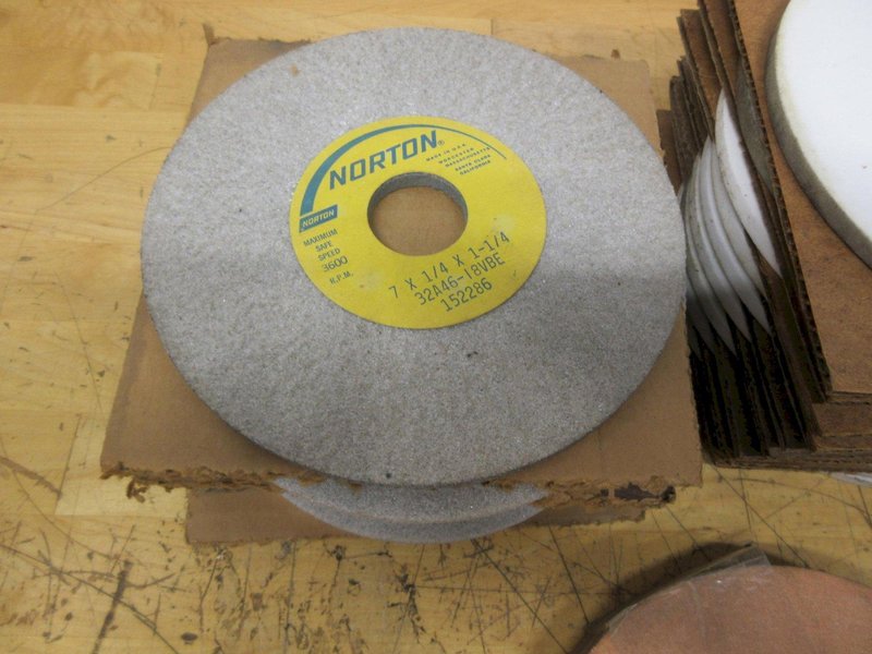 Norton Grinding Wheels 7" x 1-1/4", Assorted Widths and Types  (34pcs) **New Unused**- Auction Item