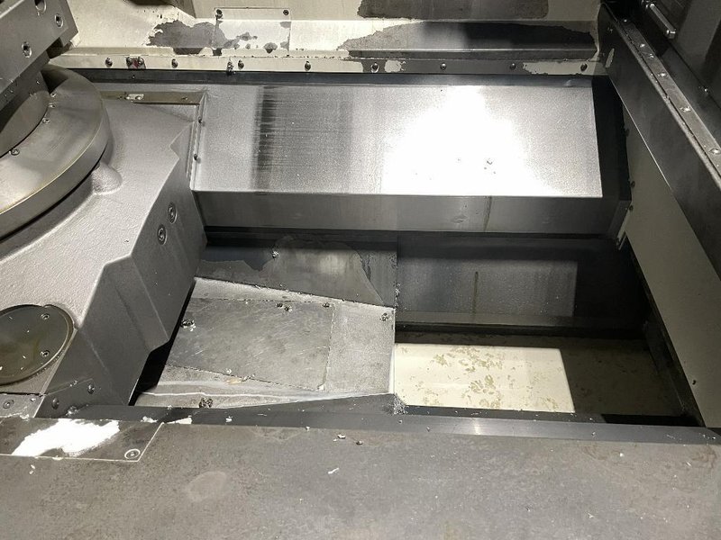 DMG Mori NHX5000 CNC Horizontal Machining Center with Pallet Changer, High Pressure Thru-Spindle Coolant, 60 Station Tool Changer, 50 HP High Torque 15,000 RPM Spindle