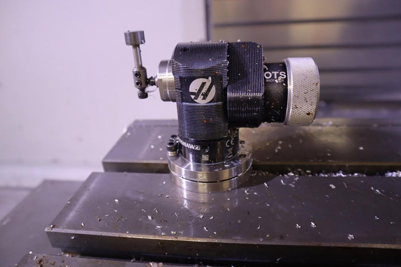 Haas VF-4SS 5-Axis CNC Vertical Machining Center,  12K RPM Spindle, 30 Station SMTC, TSC, Probing, Chip Auger, 4th and 5th Axis Drives with Haas TR-200Y Trunnion Table- NEW 2018- Auction Item