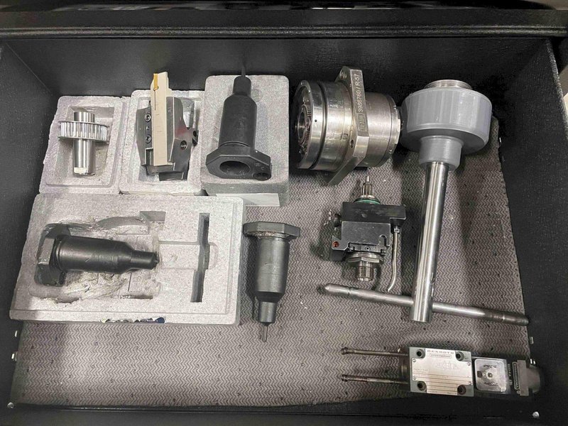Traub TNL26 CNC Swiss Lathe, 2001- LNS Bar Feeder, Mist Collector, Conveyor, 34 Stations, Live Tools