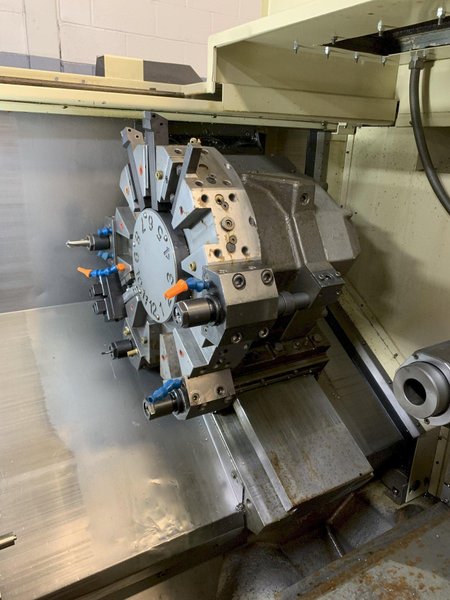 OKUMA Cadet LNC-8C CNC Turning Center, S/N D764, with 10" chuck.