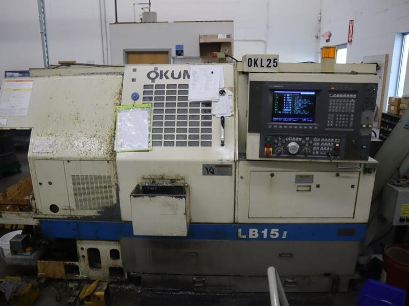 Okuma LB15 II CNC Lathe Turning Center, OSP700L CNC, 12 Station Turret, Tailstock, 8&quot; Chuck, Chip Conveyor- Auction Item