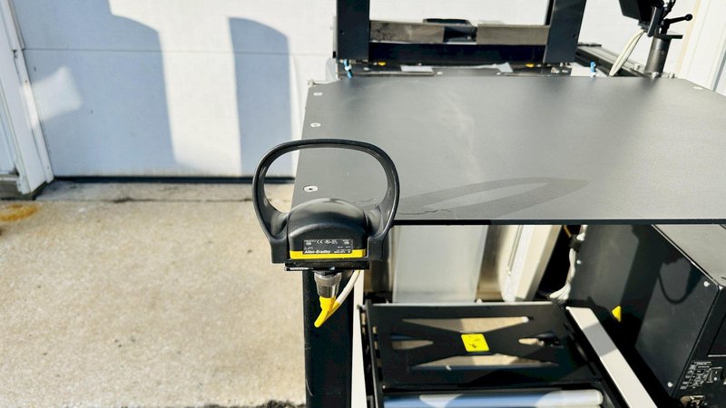 Automated Packaging Systems | Autobag 600 Bagger System  |  Vertical Orientation for Package Fulfilment with Powered Outfeed Conveyor