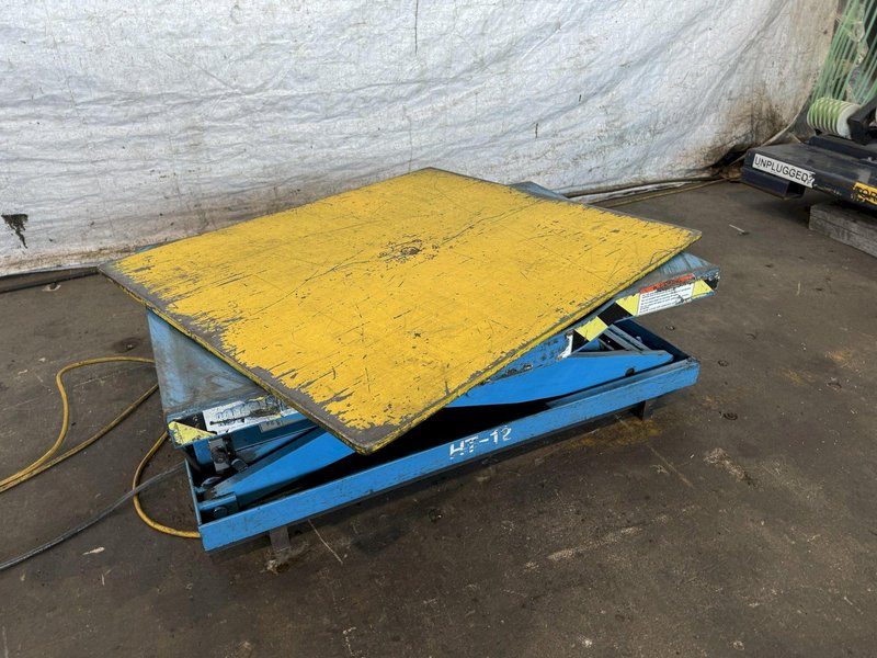 3,000 LB X 36" X 36" SOUTHWARK LIFT TABLE. STOCK # 0894824.