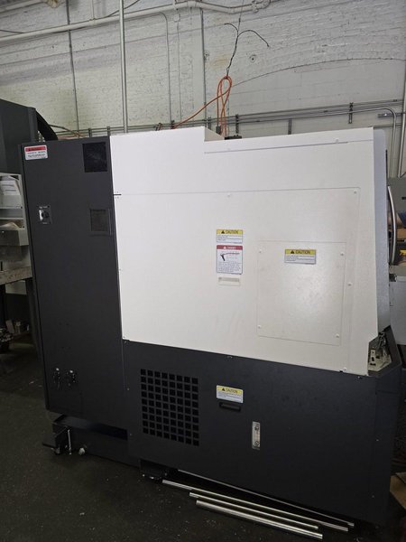 Okuma Genos L3000-e CNC Lathe, 2023 – Parts Catcher, Tailstock, Barfeed Interface