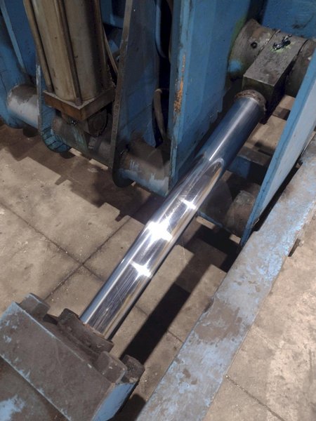 20,000 LBS BRANER HYDRAULIC COIL UPENDER WITH POWER FEED CONVEYOR: YOBRO #25238
