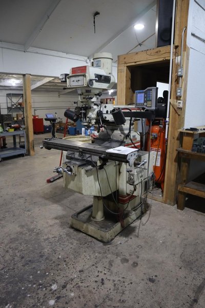 Trionics Handyman Vertical Knee Mill, Variable Speed, Accurite 2 Axis DRO, Power Table Feed- Auction Item