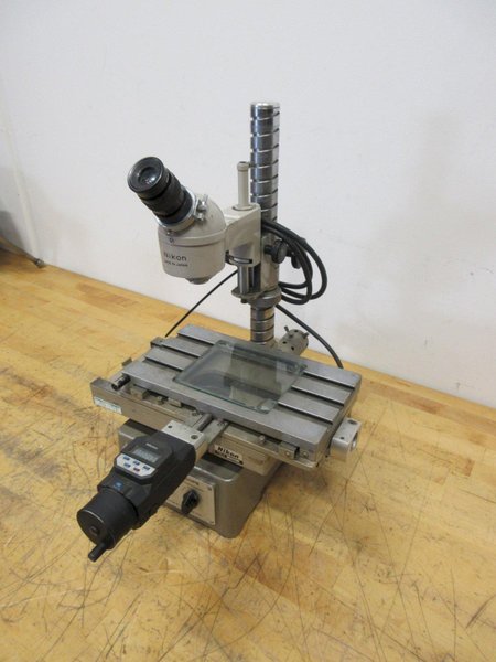 Nikon Measurescope Microscope with 15x Objective Lens, Stage Light, (1) Mitutoyo 164-162 Digital Micrometers 0-2" Range .00005" Resolution- Auction Item