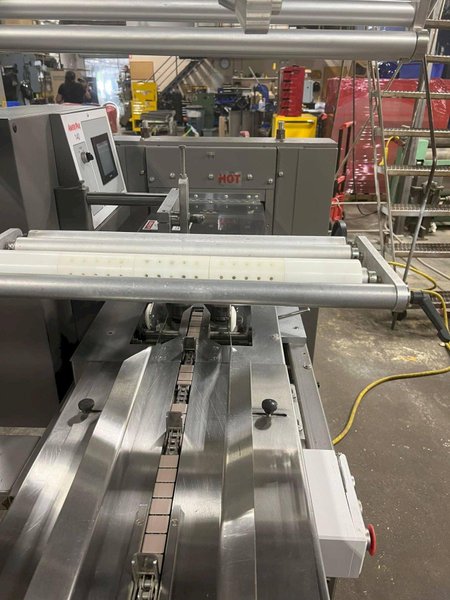 AmeriPak Model 140 Horizontal Flow Wrapper W/ 12 Ft. Feed Conveyor