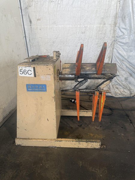 3,000 LB X 18" REGAL SRP-3000-18 MOTORIZED UNCOILER. STOCK # 0223526.