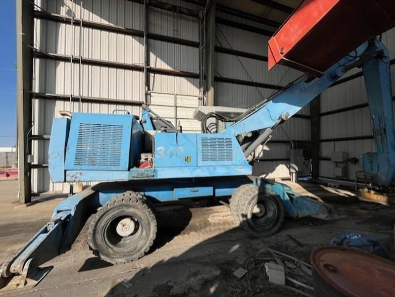 FUCHS MATERIAL HANDLER, MHL340 MAGNETIC CRANE STOCK# 3857