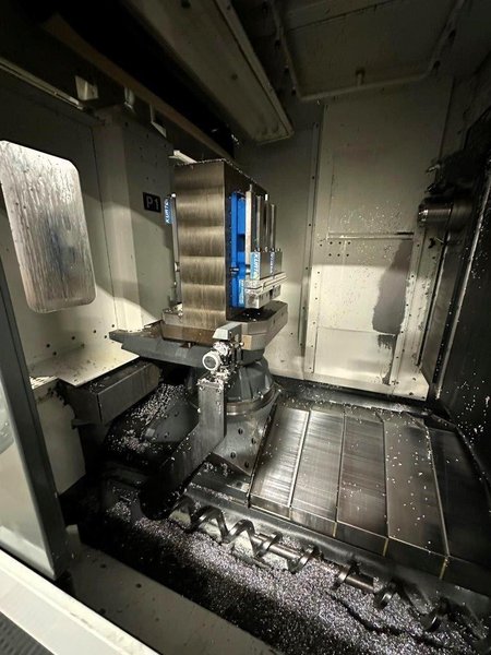 Haas EC-500 Horizontal Machining Center 2014 equipped with Haas CNC Control, CT40 Spindle, 70 Station Automatic Tool Changer, 4th Axis, Probing, Tomb Stones, TSC, Remote Hand Jog, Chip Conveyor, Coolant Pump