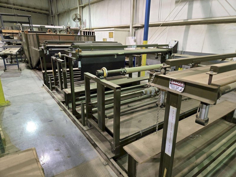 100 TON ATOM S 6110 / 2 L EV DIE CUTTING PRESS W/ UNWIND STATION. STOCK # 0772526