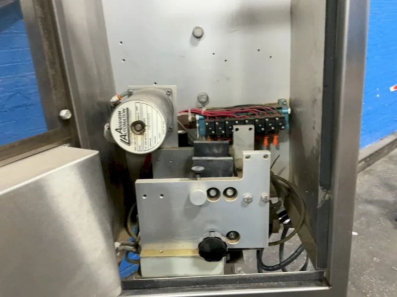 AXON CORPORATION SEALING MACHINE   -  EZ-100