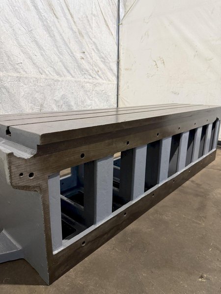25" WIDE X 89" LONG X 24.5" TALL T-SLOTTED TABLE. STOCK # 0778825