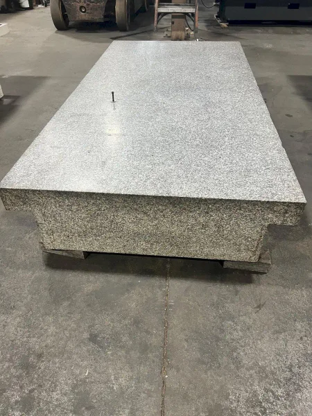 USED 8' X 4' X 14" GRANITE SURFACE PLATE WITH DRILLED AND TAPPED HOLES