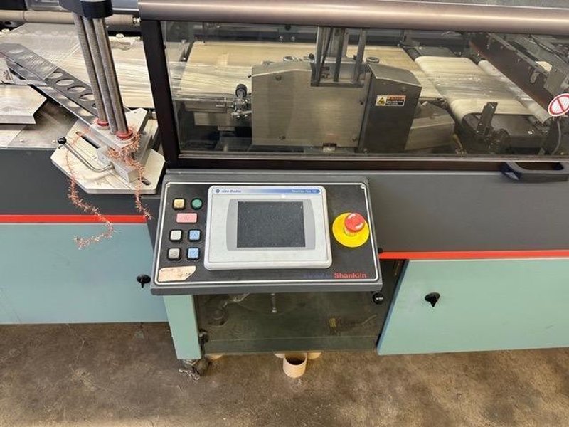 Shanklin OMNI-SLRS Shrink Wrapper with extended Lugged Infeed and T-72H Double Chamber Heat Tunnel, 2007 – Need Gone ASAP