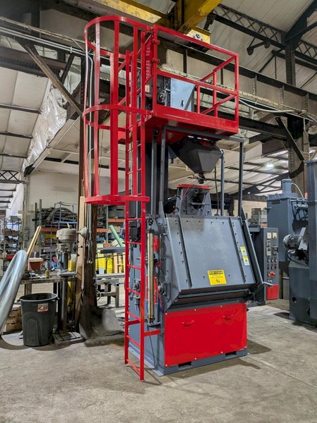 2012 DeLong 7 super model DSTB7 rubber belt tumblast machine s/n 0066281 rated at 7 cu ft capacity, 20hp direct drive shot wheel, offered rebuilt
