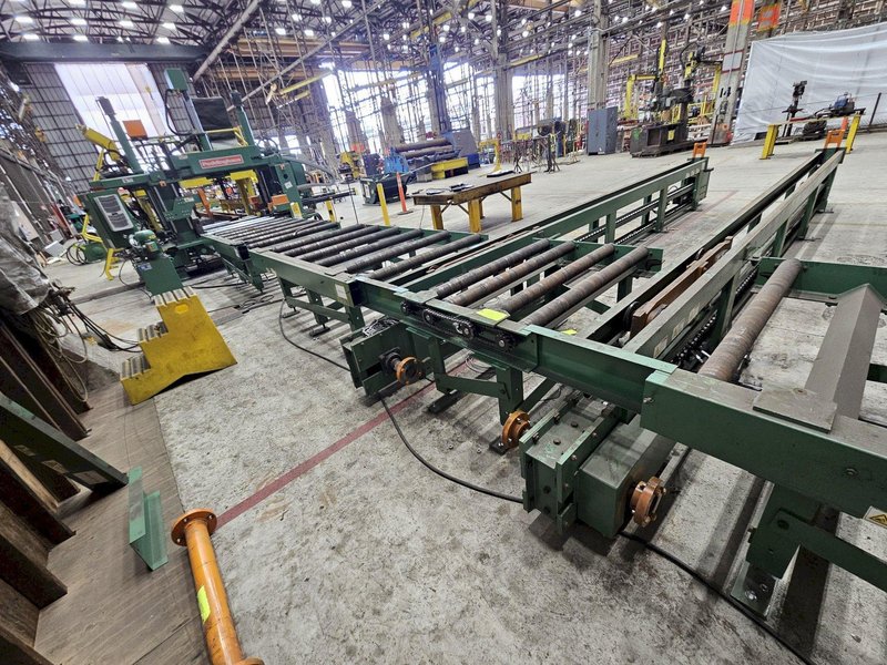 155&#039; X 44&quot; PEDDINGHAUS POWERED MATERIAL CONVEYOR WITH 7 TRANSFER ARMS. CONTROLS/HYDRAULICS INCLUDED. STOCK # 1213825