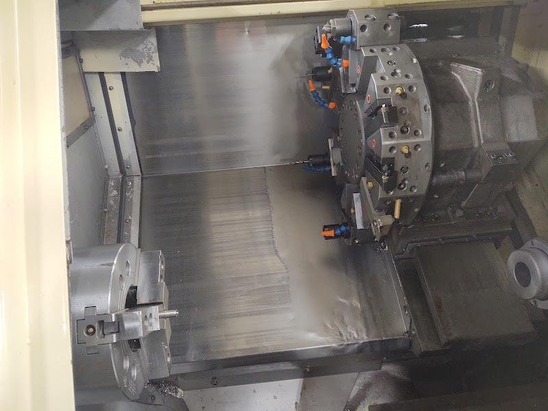 OKUMA Cadet LNC-8C CNC Turning Center, S/N D764, with 10" chuck.