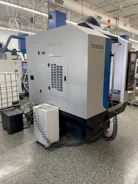 Tornos Almac CU 2007 7-Axis CNC Vertical Machining Center with Part Loading and Parts Catcher System, Probing, 20K Spindle, Lehman 2-Axis Rotary Table, Back Operation Tilting Rotary Vise