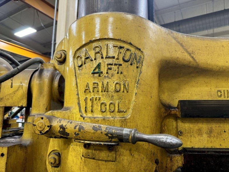 4' X 11" CARLTON RADIAL ARM DRILL. STOCK # 1114024.