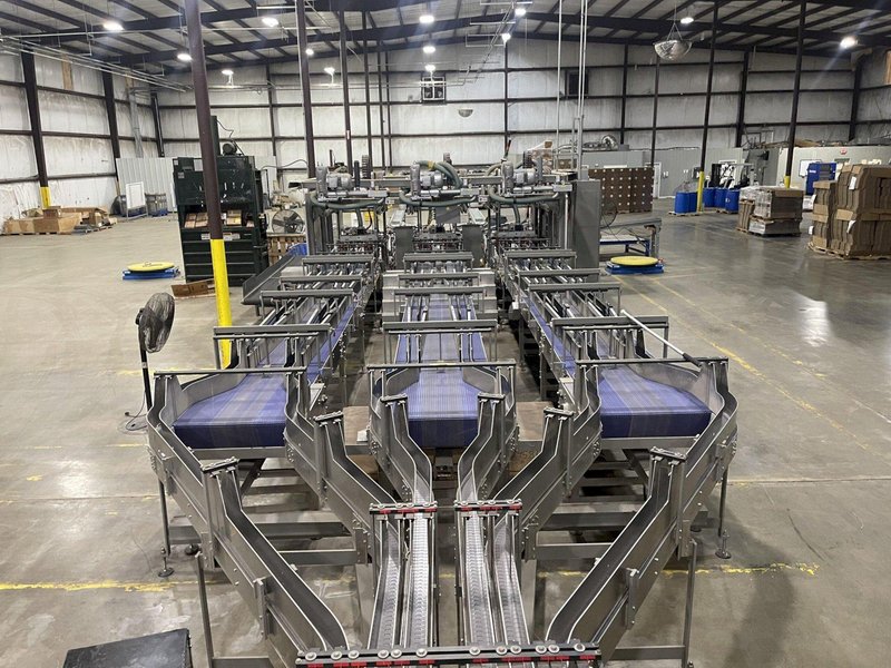 Complete End-of-Line Packaging System by Douglas/IPM for Bundling &amp; Palletizing Beverage Variety Packs