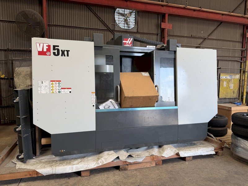HAAS VF-5 / 40 XT VERTICAL MACHINING CENTER, 60 X 26 X 25&quot; TRAVELS, CTS, WIPS, AUTO DOOR, PCOOL, HSM, 2024 - NEW