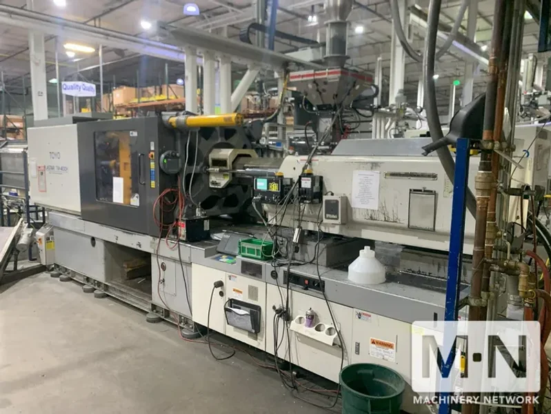 400 TON 45.3 OZ TOYO MODEL TM-400H INJECTION MOLDING MACHINE MFG 2000