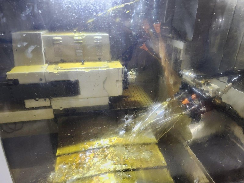 Nexturn SA-32E is a high-precision, 7-axis CNC Swiss Lathe, 32mm, 8000 RPM, Synchronous Rotary Guide Bushing, Fanuc 18i-TB, Spego 124-10 Hyd. Barfeed,  High Pressure Coolant, Chip Conveyor, 10HP, New 2007