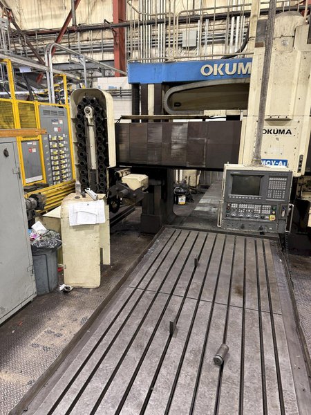 59" X 122" OKUMA MCV-A II CNC BRIDGE MILL. STOCK # 0326626