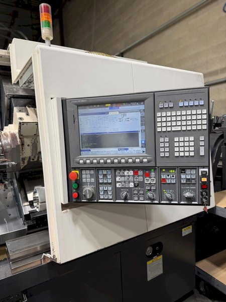 Okuma Genos L-300-MYW-e , 10″ 3-Jaw Kitagawa Chuck Main Spindle, 6″ 3-Jaw Kitagawa Chuck Sub Spindle, Y Axis, 12-Station Live Tool Turret, Tool Presetter, Parts Catcher, Chip Conveyor