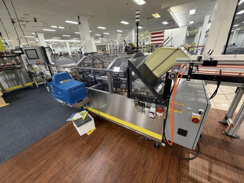 Complete Packaging Line for trays / flat Product including Custom Conveyor System, (2) Texwrap L-Bar Sealers and Heat Tunnels, Econocorp Automatic Cartoner and Case Packer and CTM Case labeler, 2023