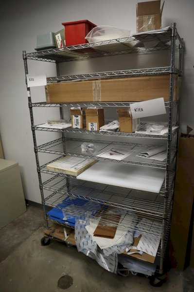 Rolling Adjustable Shelf Wire Racking with 10 Shelves and Contents- Auction Item