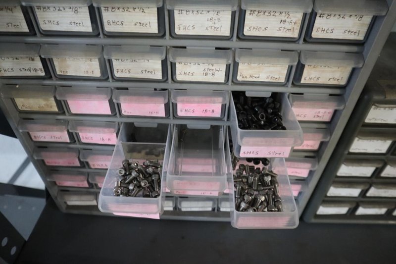 Shelving Unit with (6) Multi-Bin Cabinets with Hardware and Fasteners Contents- Auction Item