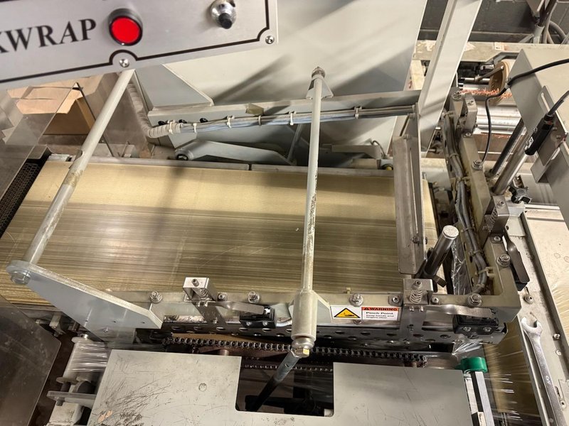 Texwrap 2219 Automatic Shrink Wrapper with Closing Conveyor for Small Product, Extended Lugged Infeed and Texwrap T-1322 Dual Chamber Heat Tunnel, 2001 – Need Gone ASAP