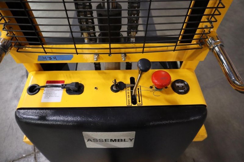 Uline H-5439 Electric Straddle Stacker Lift, 2,200# Cap, 63" Max Height, 50" Between Outriggers, 12 Volt Battery with Charger, 42" Forks- Auction Item