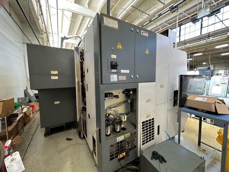 Okuma Macturn 350-W Multi-Axis CNC Lathe, 2004 – Chip Conveyor