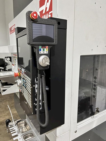 Haas UMC-400SS CNC 5-Axis Vertical Machining Center, Ct40, 12K RPM, 30 ATC, Probing, 230mm Diameter Work Platter, High Speed Machining, Programmable Coolant Nozzle, Chip Auger