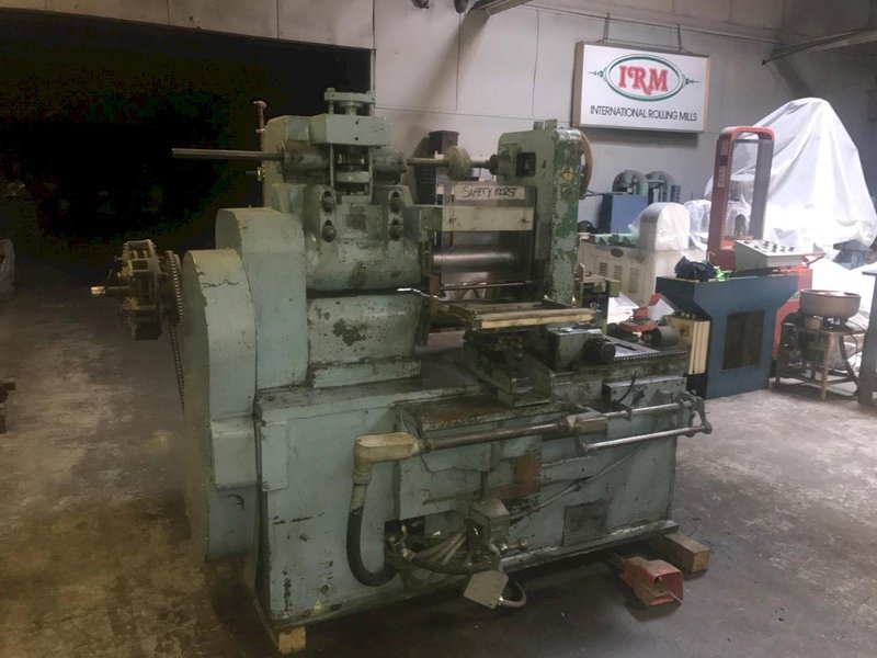 Ruesch Model 146 4.250" x 14" Slitter with Single Recoiler and Tooling