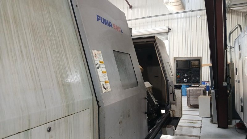 Doosan Puma 800L, 2007 – SMW Hyd Steady, 12″ Big Bore, Chip Conveyor