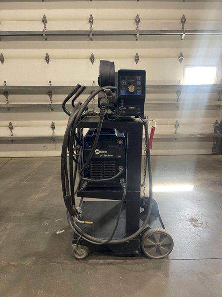 MILLER ALT 304 SERIES ARC WELDER WITH FEEDER USED