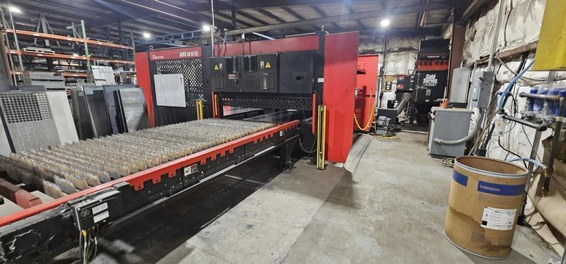 12,000 Watt Amada Regius 3015AJ Fiber Laser, 2023 – 5’x10′, Low Hours,  W/ AMS3015CL Single Pallet Automation