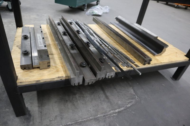 Amada Press Brake Dies, Ram Clamps and Lower Die Holders on Steel Rack- Auction Item