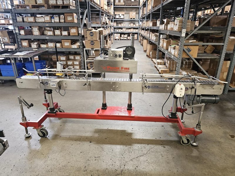 Accutek Bottling Line with Chadam Consultants 2 Head Gravity Filler, Accutek SA-1 Automatic Chuck Capper, Accutek APS106 Labelette Labeler, Everfilt Oil Filtration System, IBC Tanks