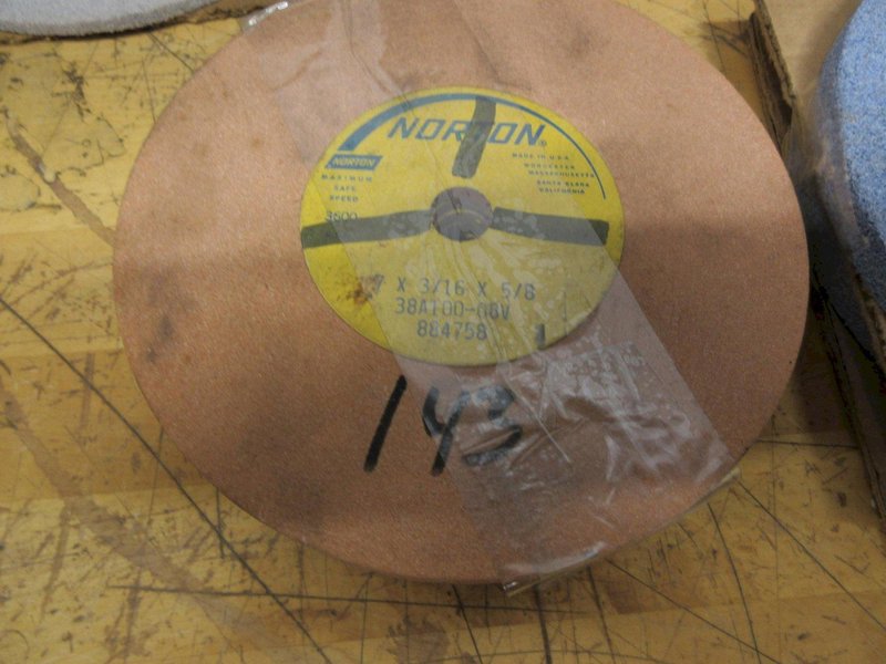 Norton Grinding Wheels 7" x 1-1/4", Assorted Widths and Types  (34pcs) **New Unused**- Auction Item