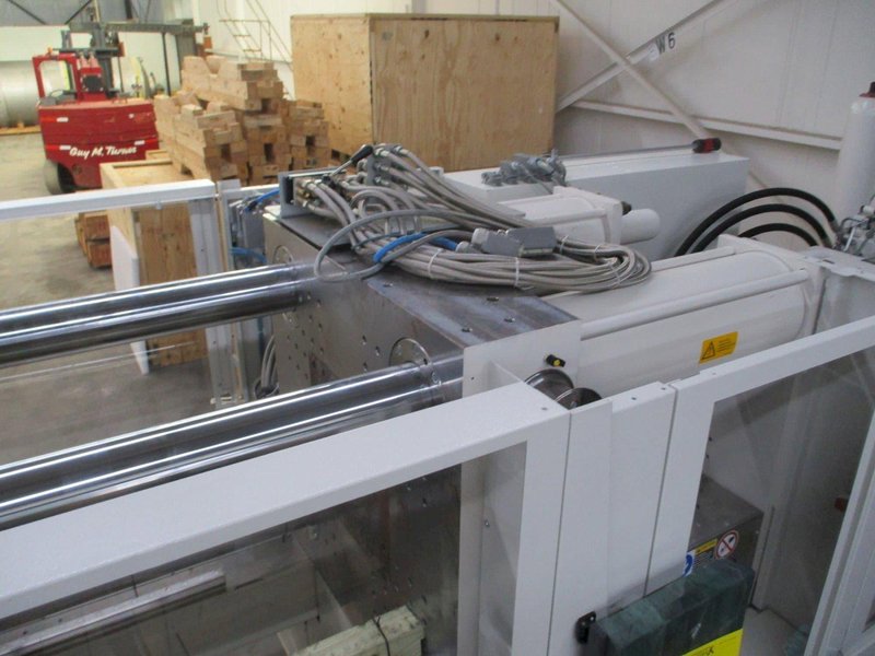 330 Ton Krauss Maffei 300-1000CX Injection Molding Machine – 2016 – 13.6 oz, Robot Ready