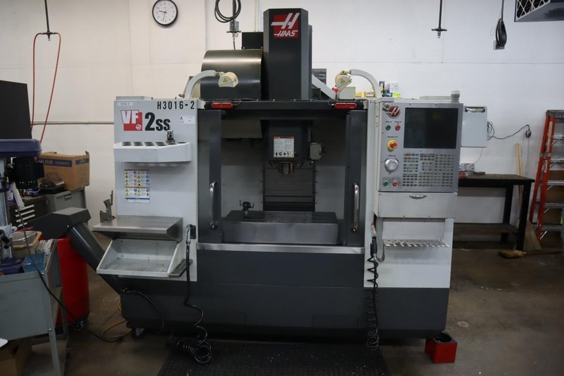 Haas VF-2SS CNC Vertical Machining Center, 12K Spindle, 24 Station SMTC, Probing, TSC, Chip Auger, 4th-Axis Brushless Drive - NEW 2014- Auction Item