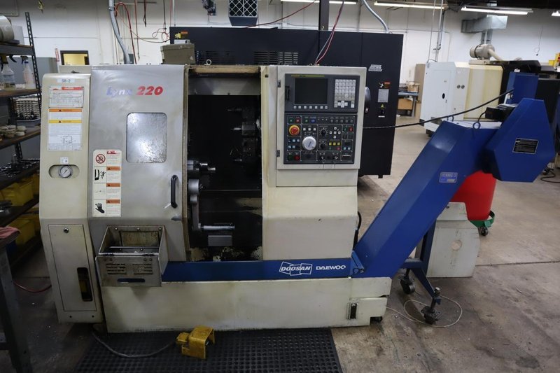 Daewoo Doosan Lynx 220C CNC Turning Center, 8" 3-Jaw Chuck, 12 Station Turret, Parts Catcher, Tool Presetter, Chip Conveyor- Auction Item